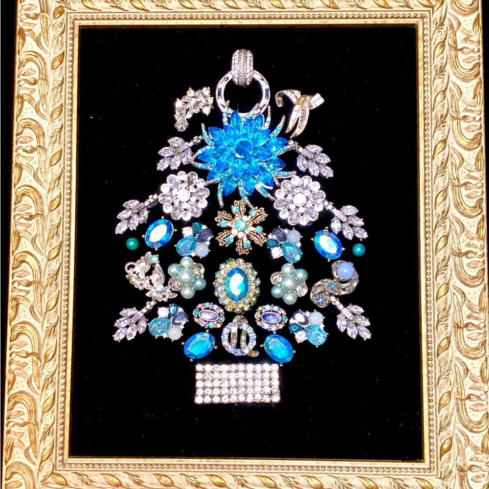 Spectacular Christmas tree done in blues, silver and zirconia on black velvet